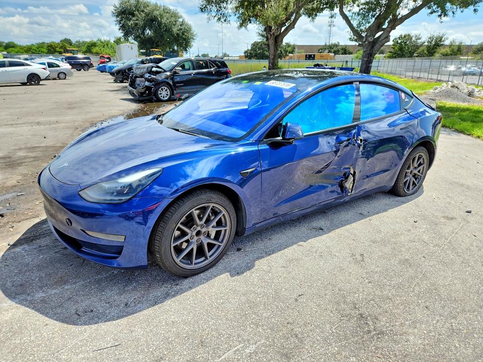 TESLA MODEL 3 2021 with VIN 5YJ3E1EA0MF867010 - Photo from auction