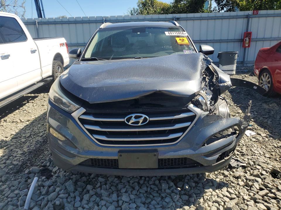 Photo 5 from auction – 2017 HYUNDAI TUCSON with VIN KM8J3CA40HU444557
