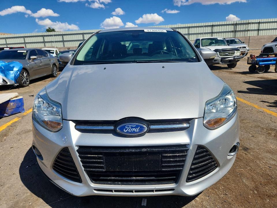 Photo 5 from auction – 2012 FORD FOCUS with VIN 1FAHP3M2XCL206351