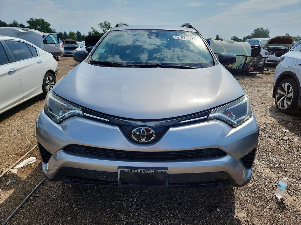 Photo 5 from auction – 2018 TOYOTA RAV4 with VIN JTMZFREV3JJ197692