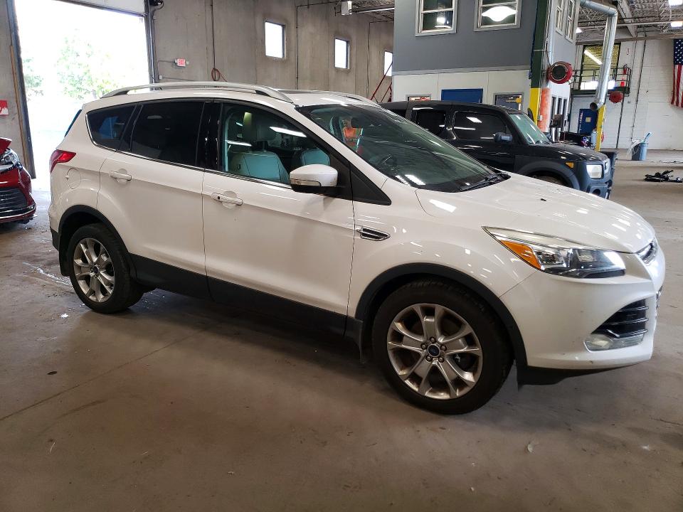 Photo 4 from auction – 2014 FORD ESCAPE with VIN 1FMCU0J97EUA62697