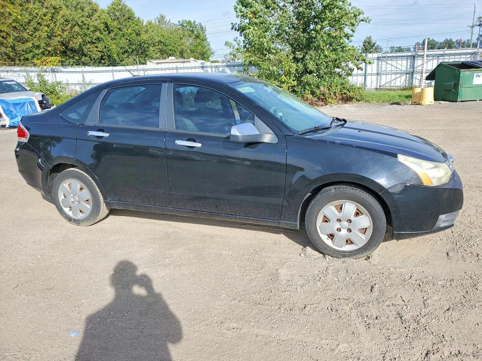 Снимка 4 от търг – 2009 FORD FOCUS с VIN 1FAHP35N29W137672