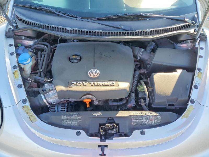 Photo 11 from auction – 2004 VOLKSWAGEN NEW BEETLE with VIN 3VWCD31Y14M331404