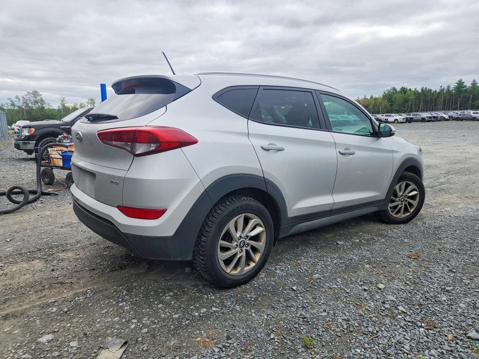 Снимка 3 от търг – 2016 HYUNDAI TUCSON с VIN KM8J3CA4XGU052104