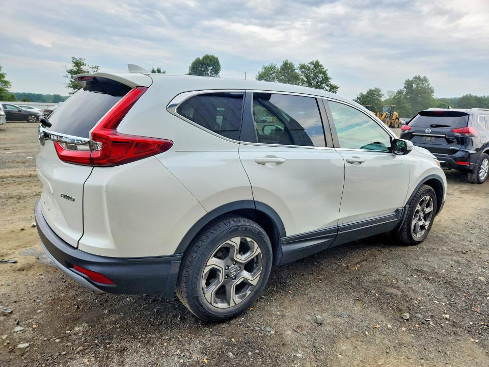 Photo 3 from auction – 2018 HONDA CR-V with VIN 2HKRW2H55JH666776