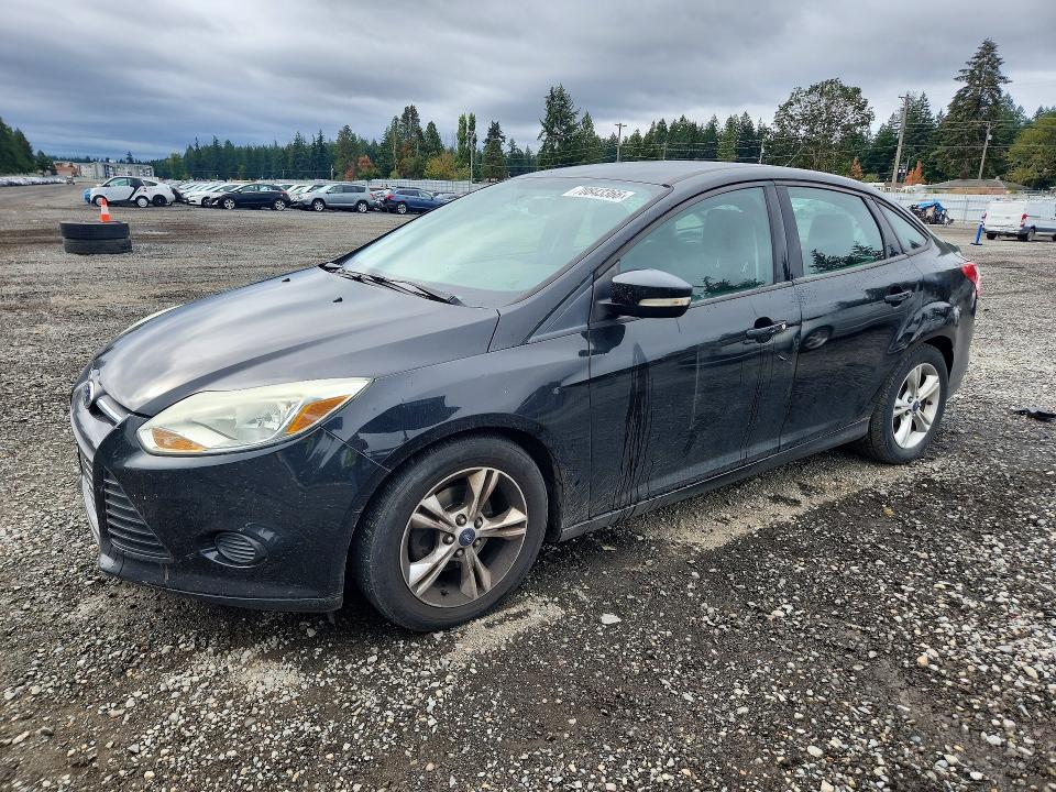 FORD FOCUS 2014 with VIN 1FADP3F22EL392255 - Photo from auction