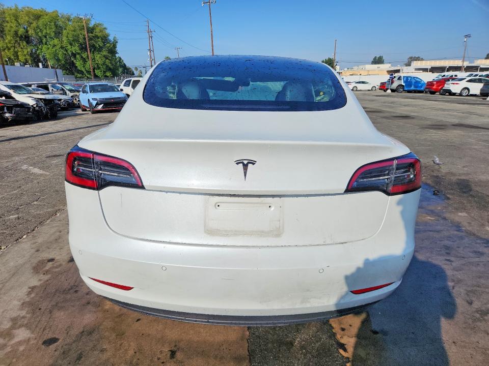 Снимка 6 от търг – 2022 TESLA MODEL 3 с VIN 5YJ3E1EAXNF304550