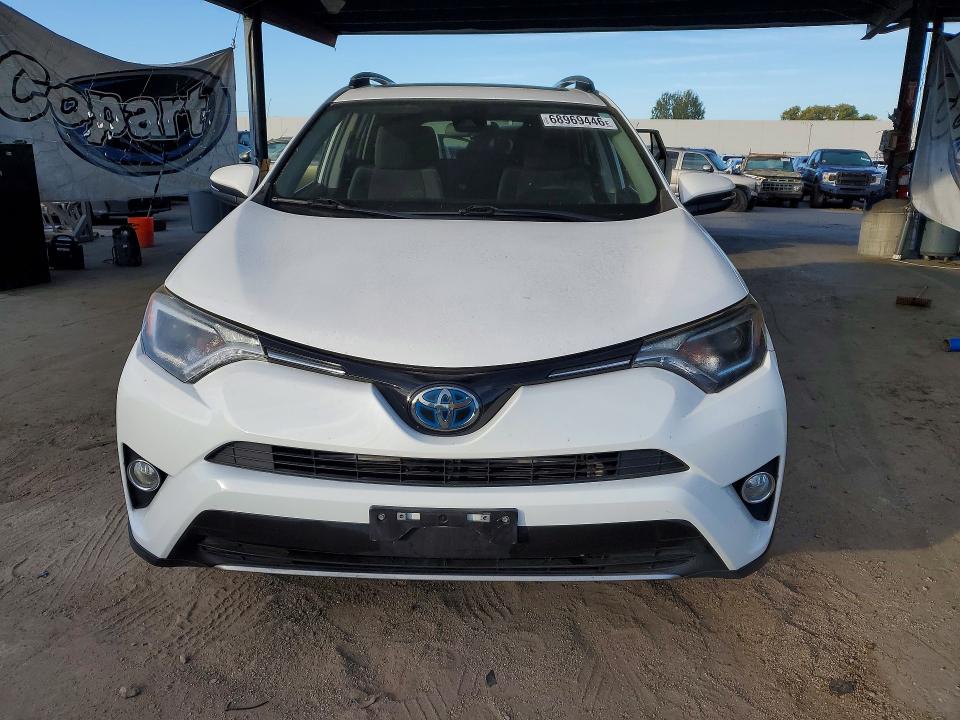 Photo 5 from auction – 2017 TOYOTA RAV4 HYBRID with VIN JTMRJREV6HD138367
