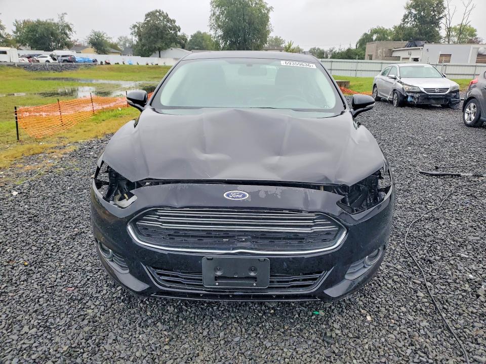 Фото 5 с аукциона – 2016 FORD FUSION с VIN 3FA6P0H90GR154359