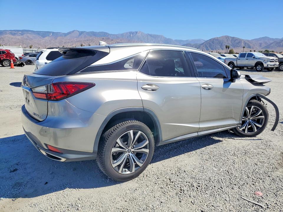 Photo 3 from auction – 2022 LEXUS RX with VIN 2T2HZMAA8NC244060