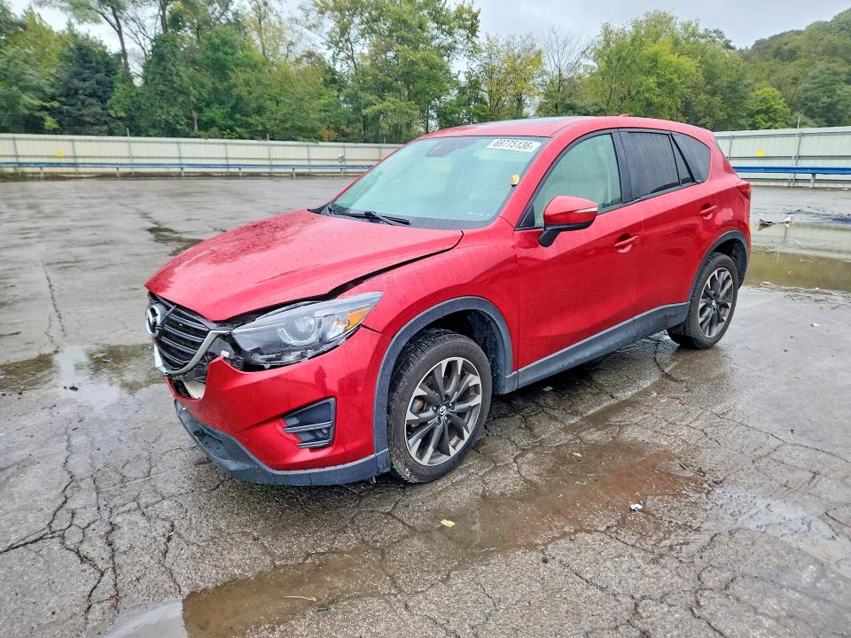 MAZDA CX-5 2016 с VIN JM3KE4DY9G0740777 - Снимка от търг