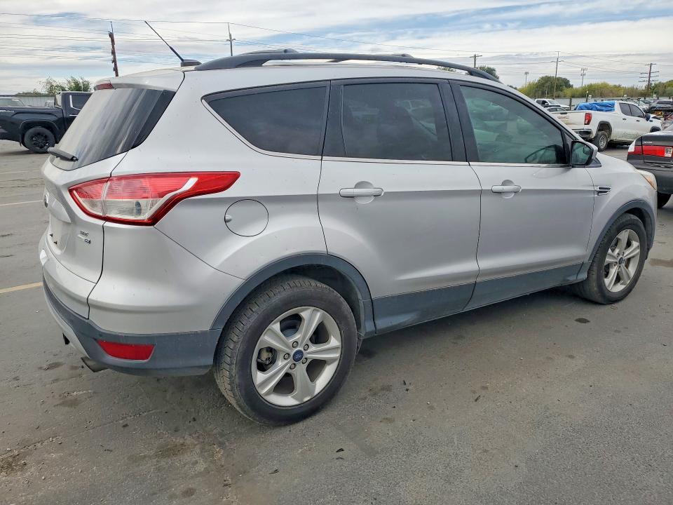 Photo 3 from auction – 2015 FORD ESCAPE with VIN 1FMCU9G9XFUC29082