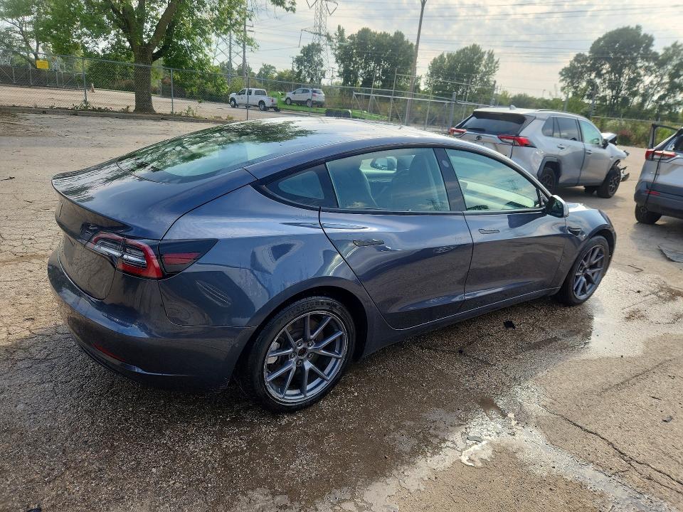 Photo 3 from auction – 2022 TESLA MODEL 3 with VIN 5YJ3E1EA6NF370996