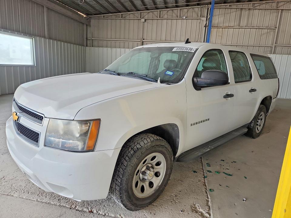 CHEVROLET SUBURBAN 2013 with VIN 1GNSC5E0XDR140734 - Photo from auction