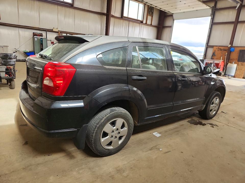 Foto 3 de la subasta – 2009 DODGE CALIBER con VIN 1B3HB28A49D136029