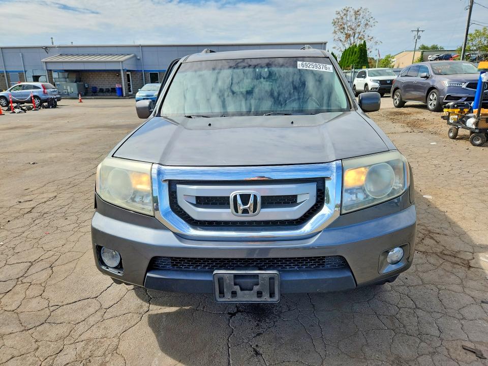 Photo 5 from auction – 2011 HONDA PILOT with VIN 5FNYF4H79BB094104