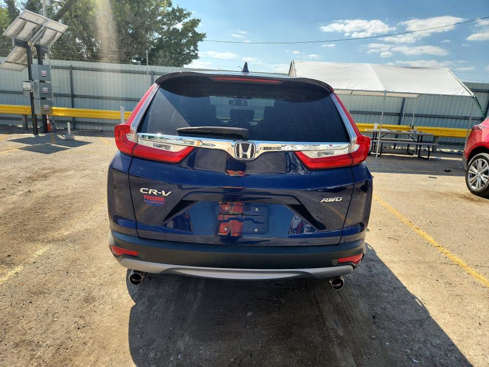 Photo 6 from auction – 2019 HONDA CR-V with VIN 5J6RW2H84KL006066