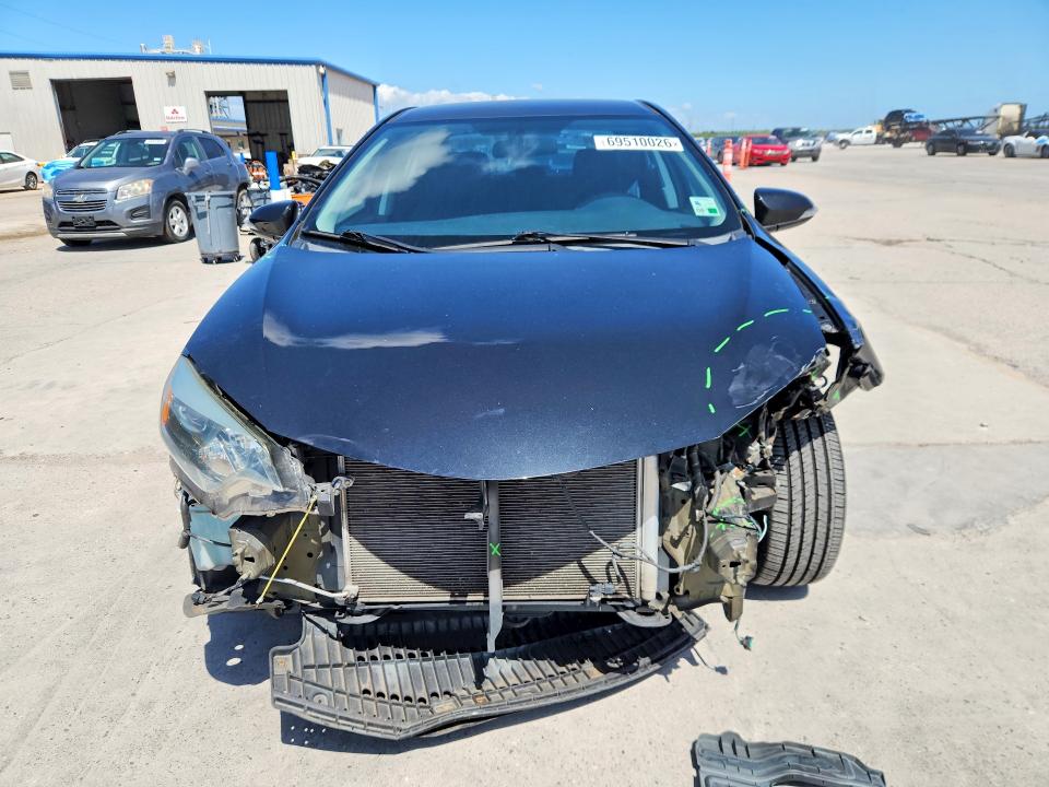 Photo 5 from auction – 2016 TOYOTA COROLLA with VIN 5YFBURHEXGP490772