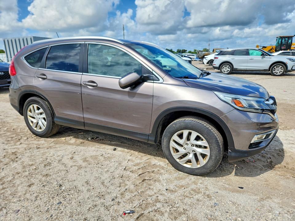 Photo 4 from auction – 2016 HONDA CR-V with VIN 2HKRM4H70GH682296