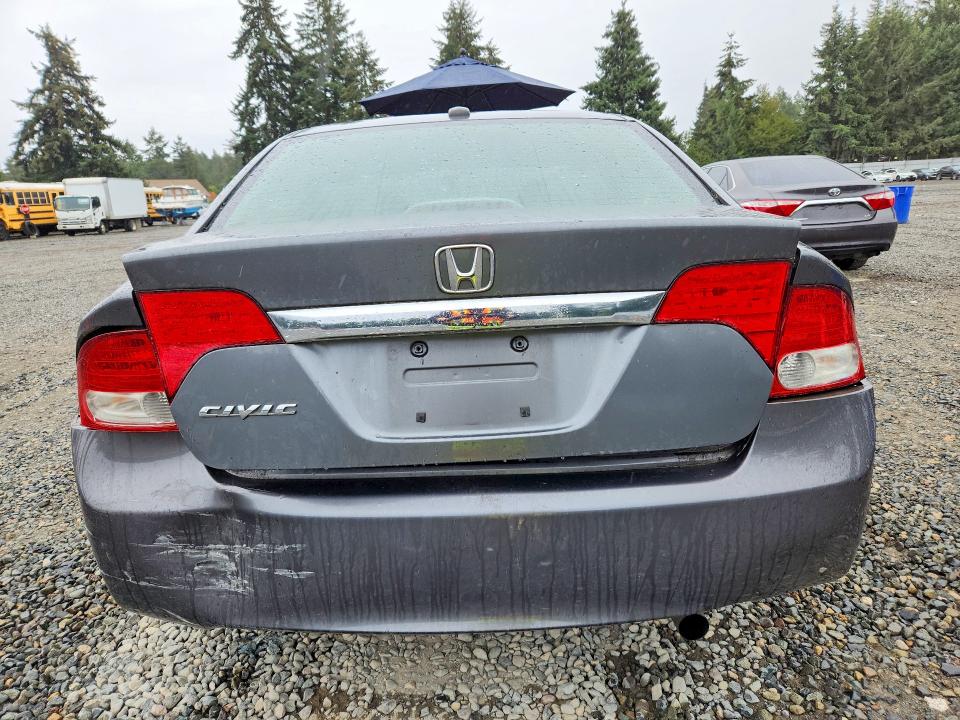 Photo 6 from auction – 2010 HONDA CIVC with VIN 19XFA1F92AE021945