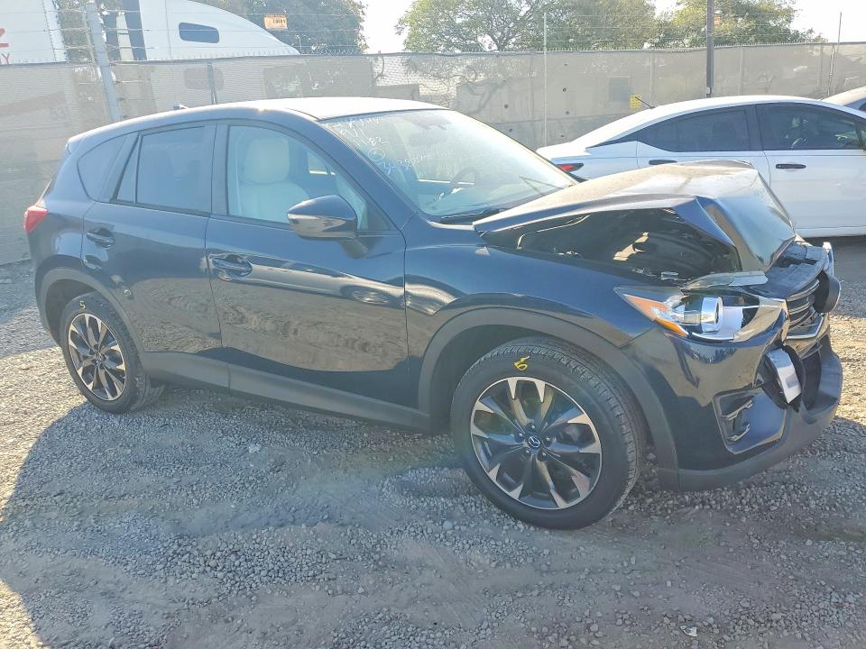 Photo 4 from auction – 2016 MAZDA CX-5 with VIN JM3KE2DY2G0803092