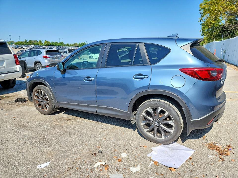 Снимка 2 от търг – 2016 MAZDA CX-5 с VIN JM3KE2DY1G0885591