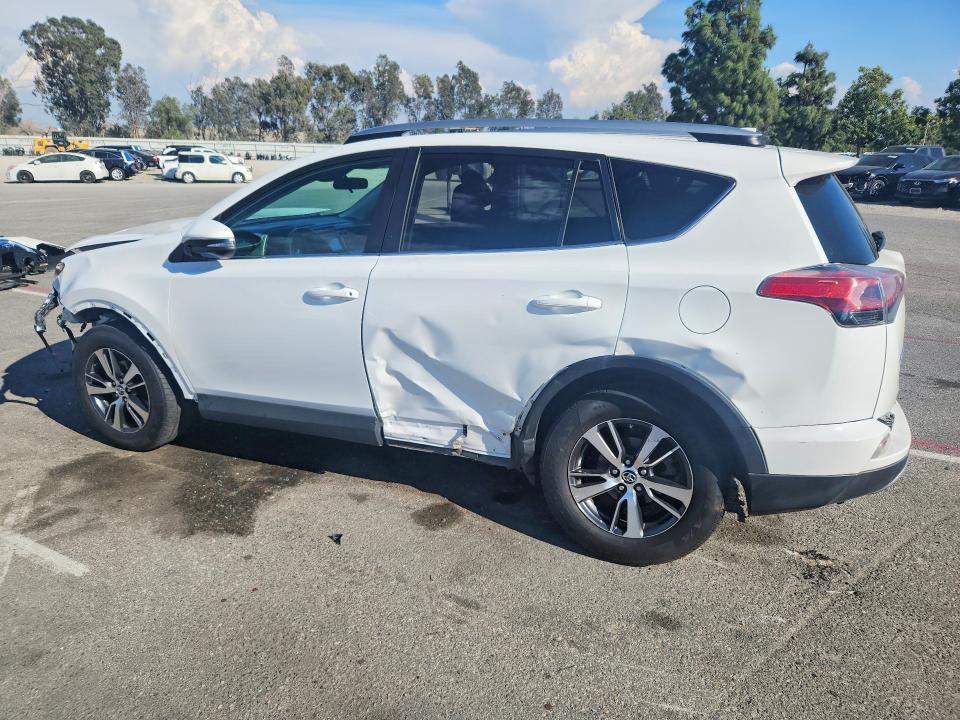 Photo 2 from auction – 2017 TOYOTA RAV4 with VIN 2T3RFREVXHW587698