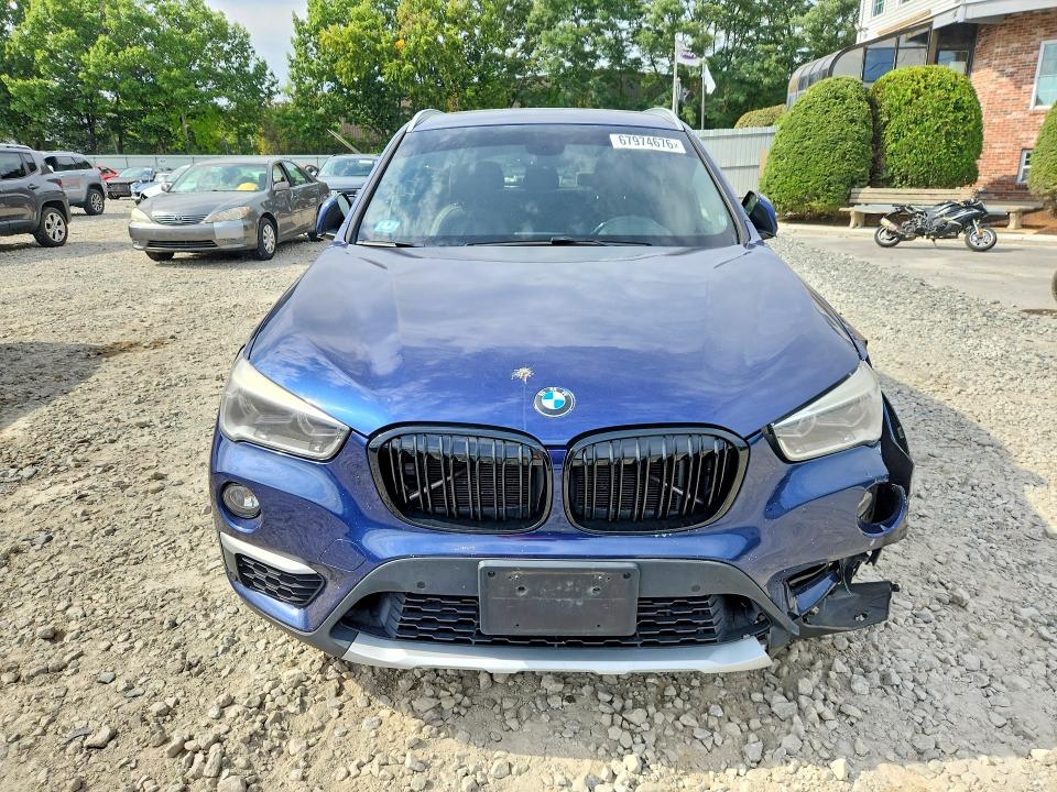 Photo 5 from auction – 2016 BMW X1 with VIN WBXHT3C3XGP887161