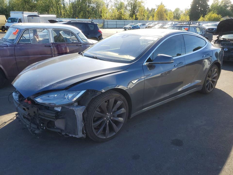 Снимка 1 от търг – 2014 TESLA MODEL S с VIN 5YJSA1H1XEFP57389