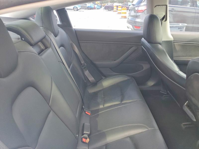 Снимка 10 от търг – 2018 TESLA MODEL 3 с VIN 5YJ3E1EA0JF026106