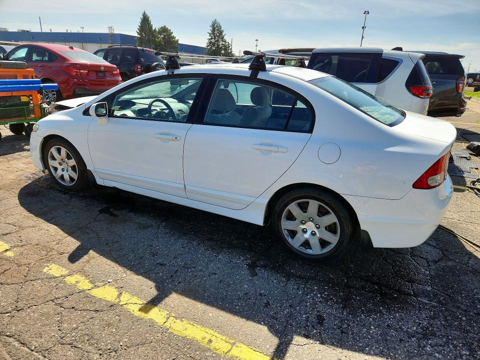 Photo 2 from auction – 2011 HONDA CIVIC with VIN 19XFA1F55BE014339
