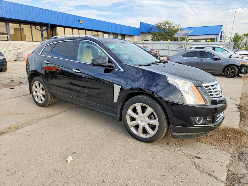 Photo 4 from auction – 2015 CADILLAC SRX with VIN 3GYFNGE37FS571858