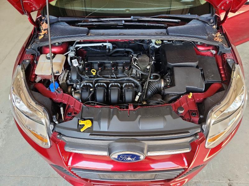 Photo 11 from auction – 2014 FORD FOCUS with VIN 1FADP3F23EL388831