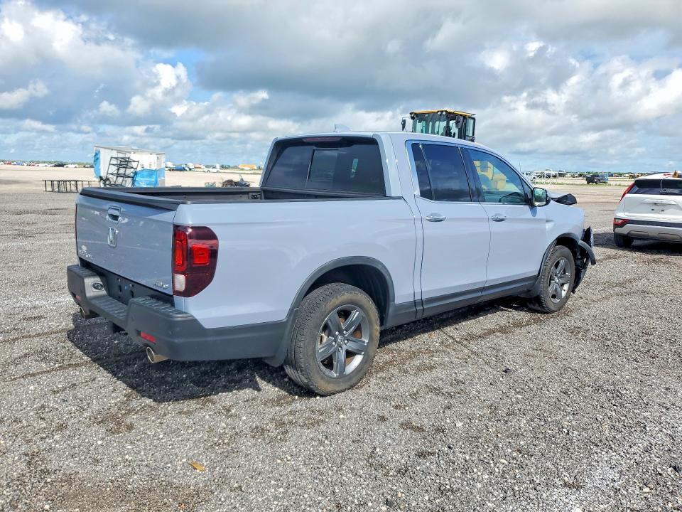 Photo 3 from auction – 2022 HONDA RIDGELINE with VIN 5FPYK3F76NB032387