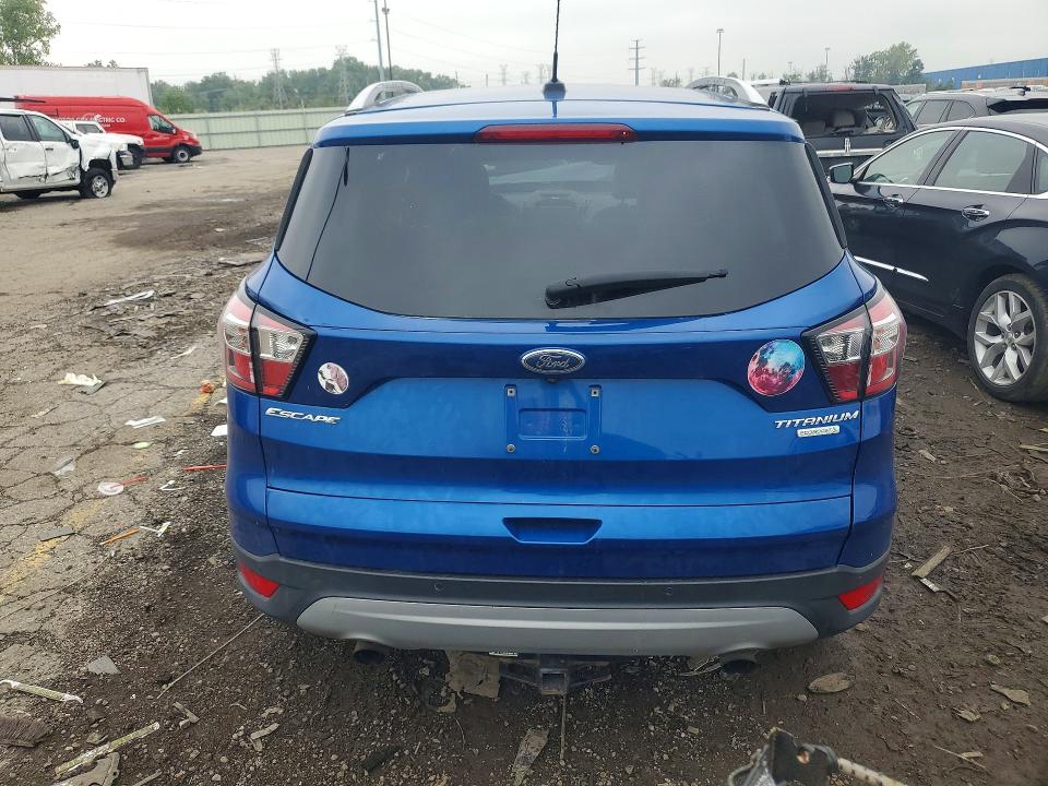 Снимка 6 от търг – 2017 FORD ESCAPE с VIN 1FMCU0JD4HUE57350