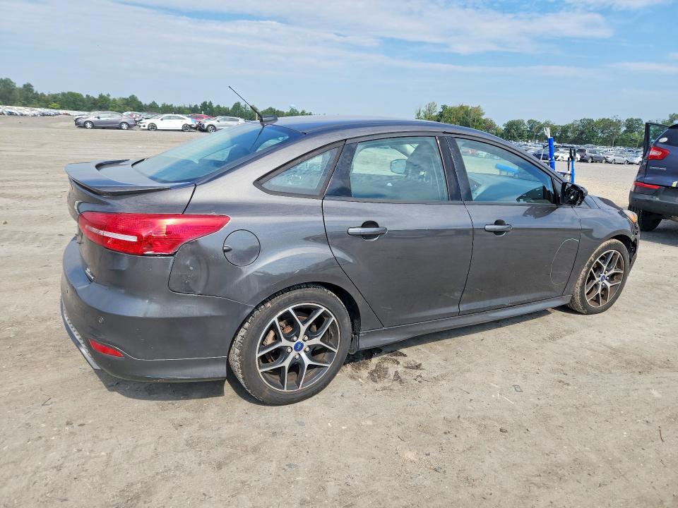 Photo 3 from auction – 2015 FORD FOCUS with VIN 1FADP3F2XFL292339