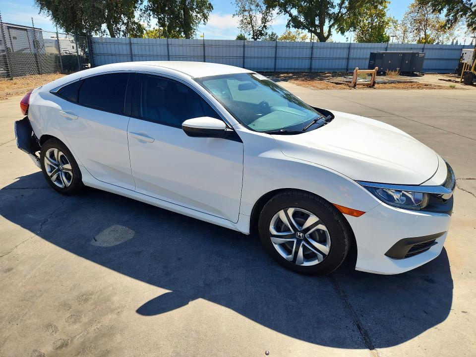 Photo 4 from auction – 2018 HONDA CIVIC with VIN 2HGFC2F57JH592995