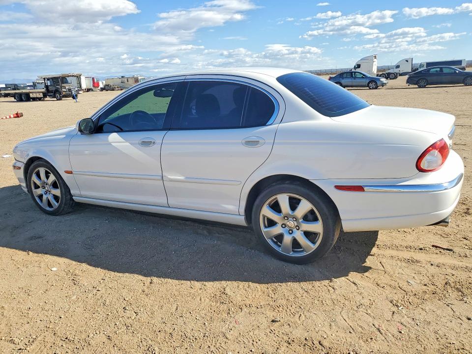Фото 2 с аукциона – 2004 JAGUAR X-TYPE с VIN SAJEA51C14WE00049