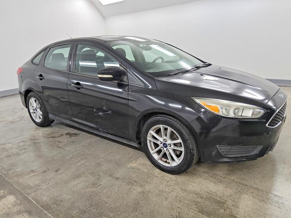 Photo 4 from auction – 2015 FORD FOCUS with VIN 1FADP3F20FL206116