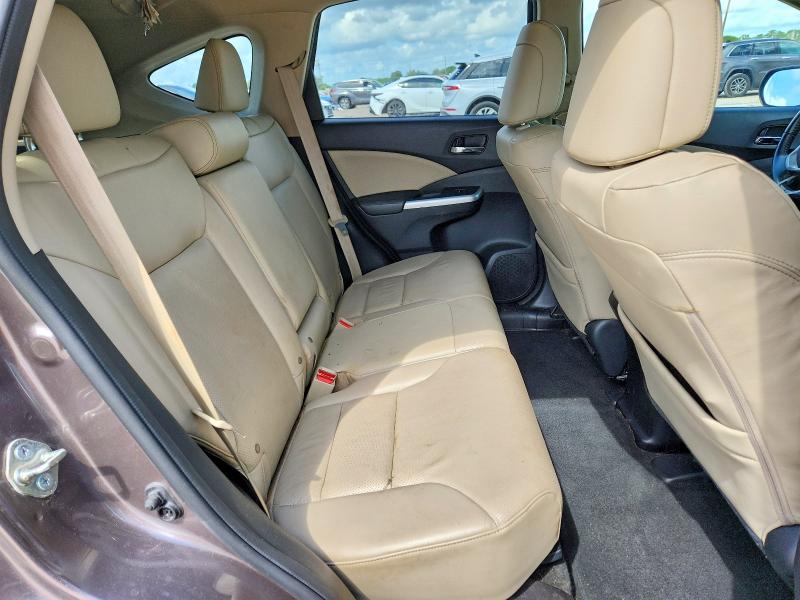 Photo 11 from auction – 2016 HONDA CR-V with VIN 2HKRM4H70GH682296