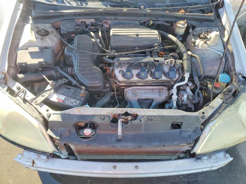 Фото 11 с аукциона – 2002 HONDA CIVIC с VIN 1HGES16552L070461