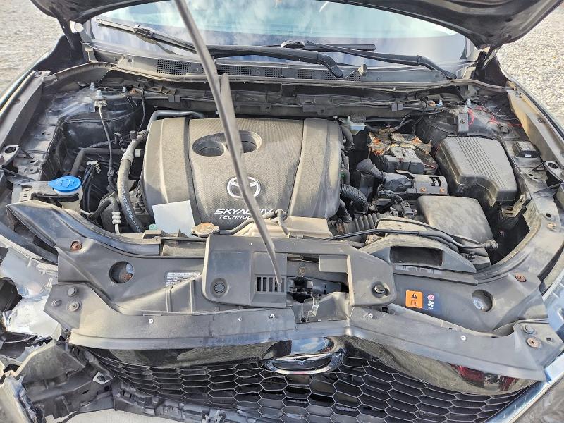 Снимка 12 от търг – 2015 MAZDA CX-5 с VIN JM3KE4CY4F0508698
