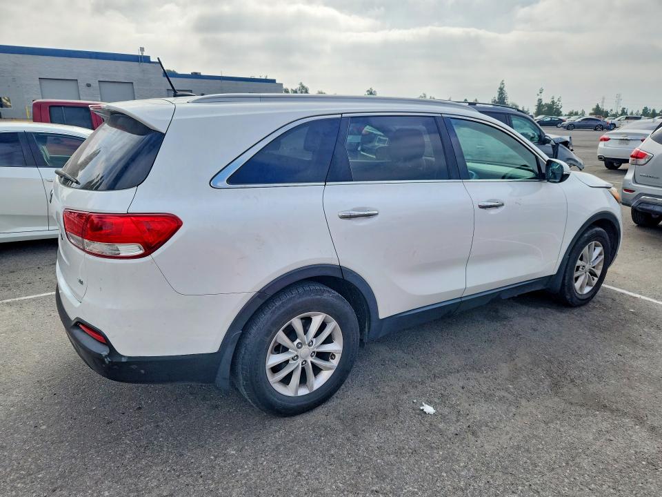 Photo 3 from auction – 2016 KIA SORENTO with VIN 5XYPG4A57GG108793