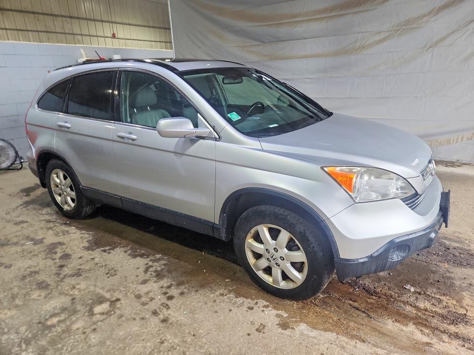 Photo 4 from auction – 2009 HONDA CR-V with VIN JHLRE48709C015646