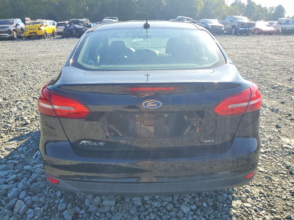 Снимка 6 от търг – 2017 FORD FOCUS с VIN 1FADP3H27HL322347
