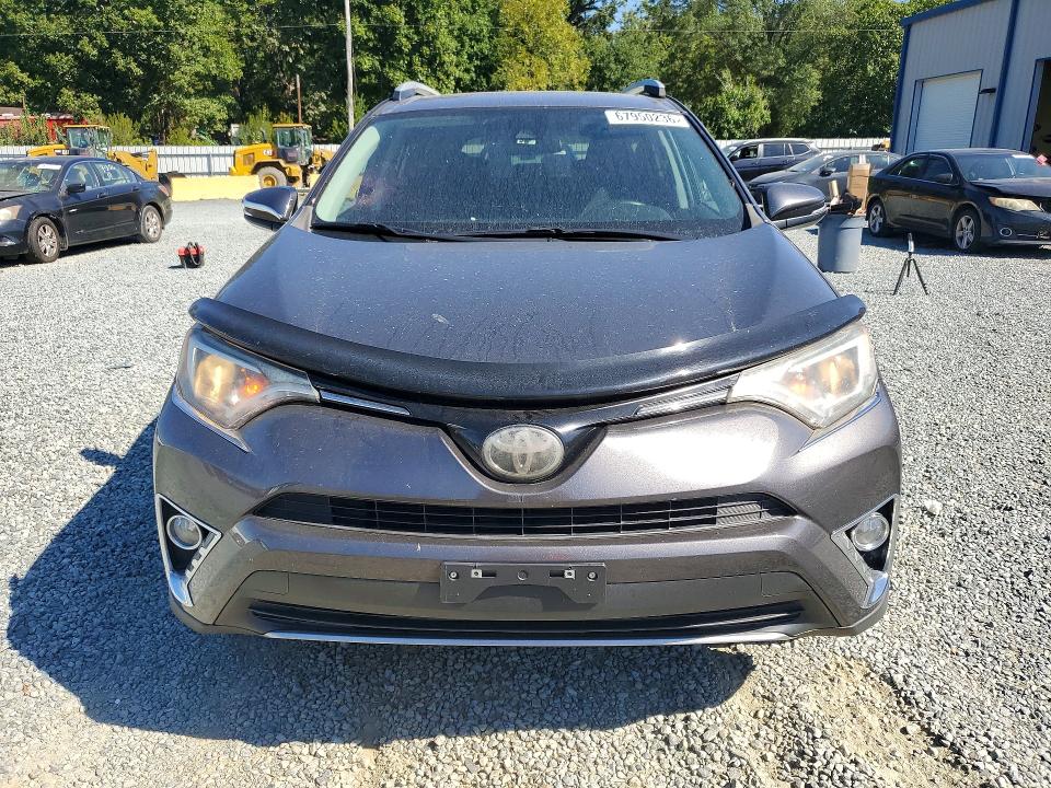 Photo 5 from auction – 2018 TOYOTA RAV4 with VIN 2T3WFREV3JW470800