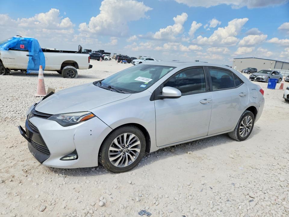 TOYOTA COROLLA 2019 with VIN 5YFBURHE9KP867908 - Photo from auction