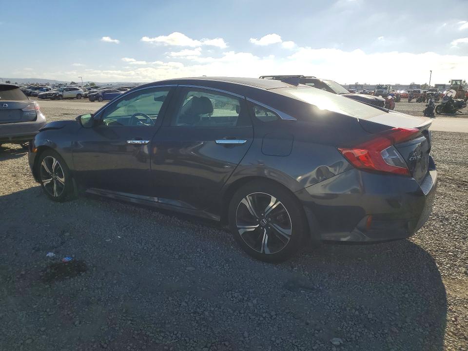 Photo 2 from auction – 2017 HONDA CIVIC with VIN 2HGFC1F9XHH634230