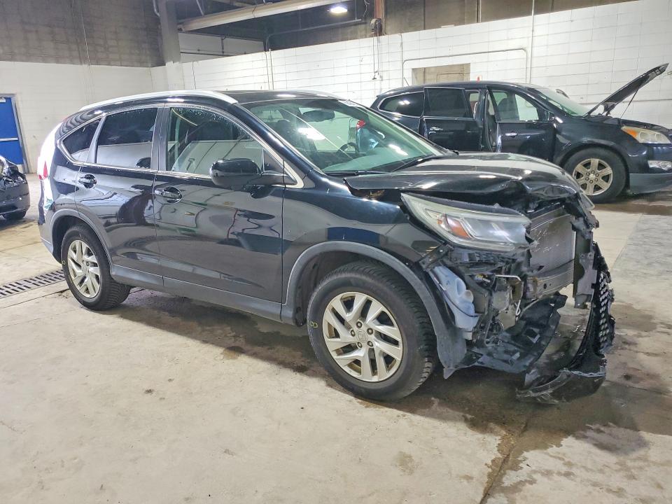 Photo 4 from auction – 2016 HONDA CR-V with VIN 5J6RM4H77GL030314