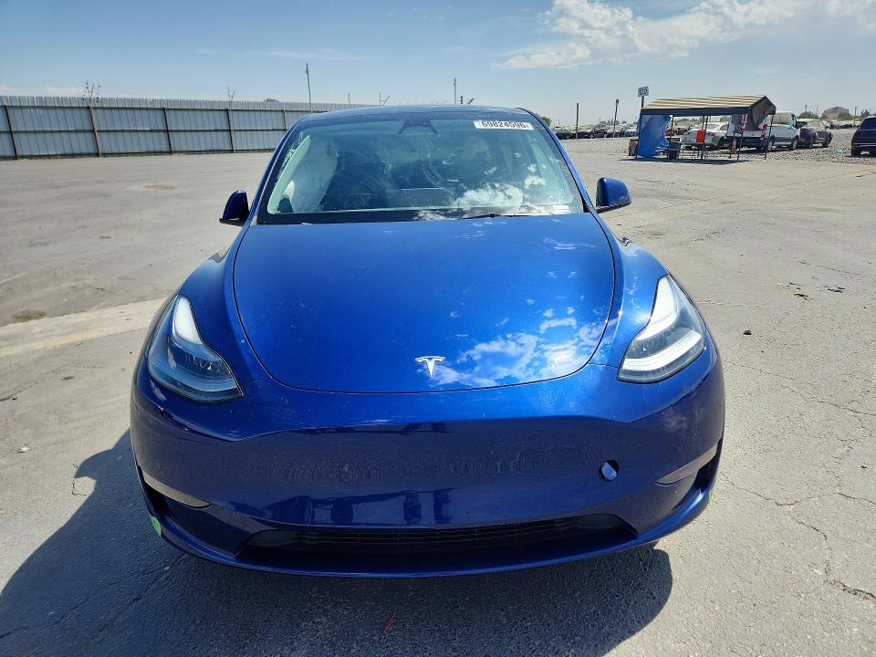 Photo 5 from auction – 2023 TESLA MODEL Y with VIN 7SAYGDEE0PF784334